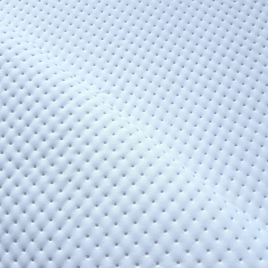 Tkanina tapicerska Ekoskóra pikowana kropki biała