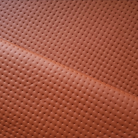 Tkanina tapicerska Ekoskóra pikowana kropki jasny brąz